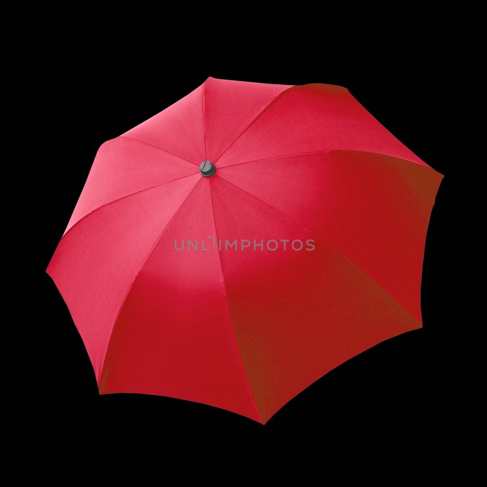 Red umbrella isolated over a black background
