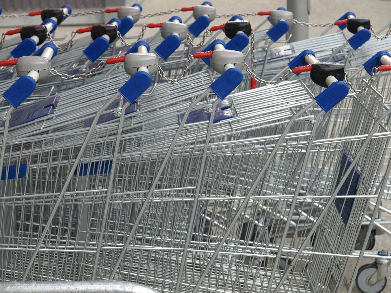 Row of supermarket shopping carts or trolleys