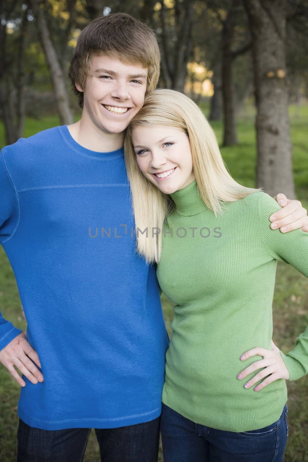 Portrait of a Brother and Sister Embracing in a Park