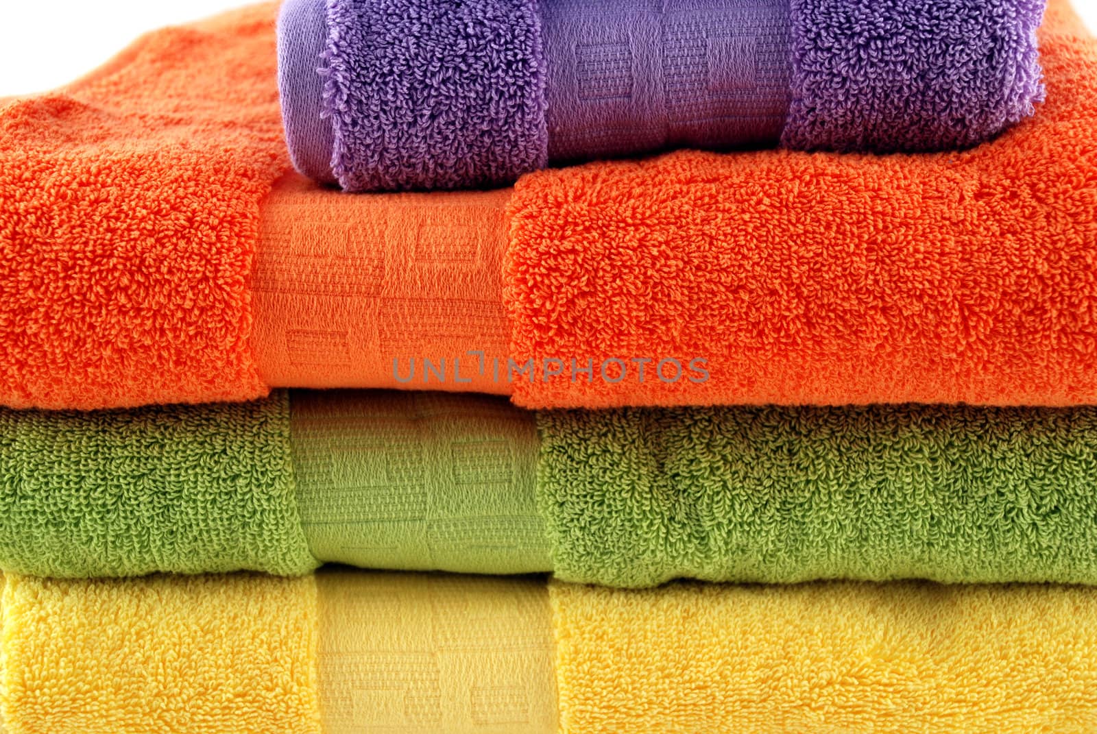 stock pictures of colorful bath towels stacked