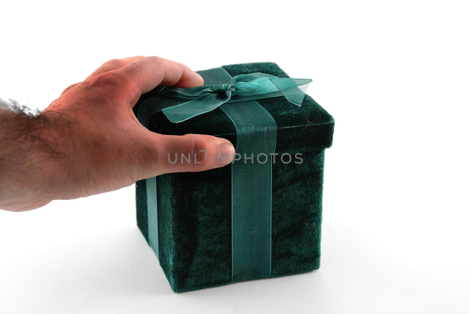 Green gift box with a laced up bow