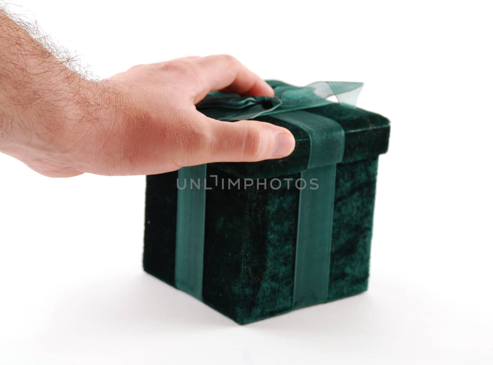 Green gift box with a laced up bow