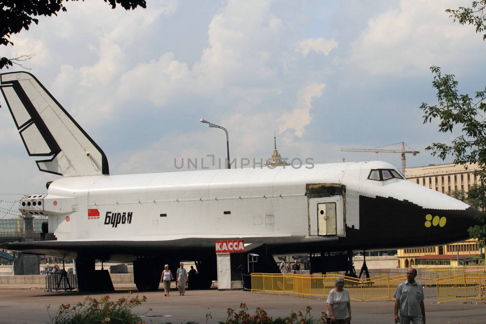 spacecraft "Buran" against the background of an amusement park vacation