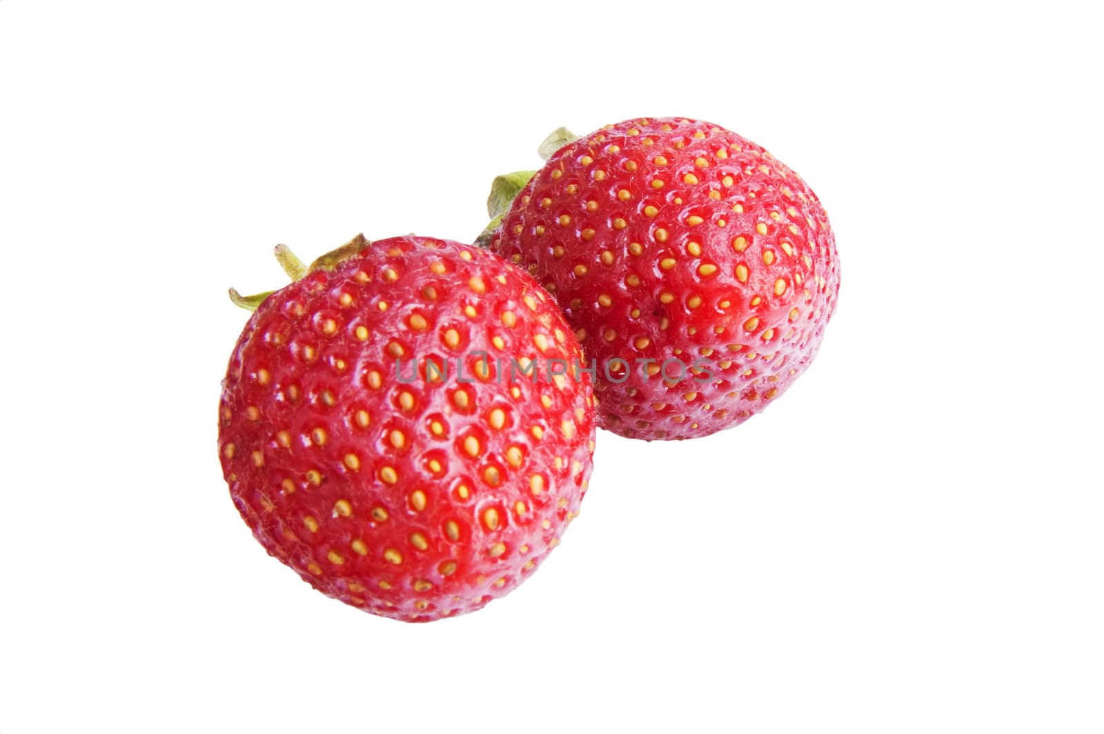 A Photo of a Couple of Isolated Strawberrys