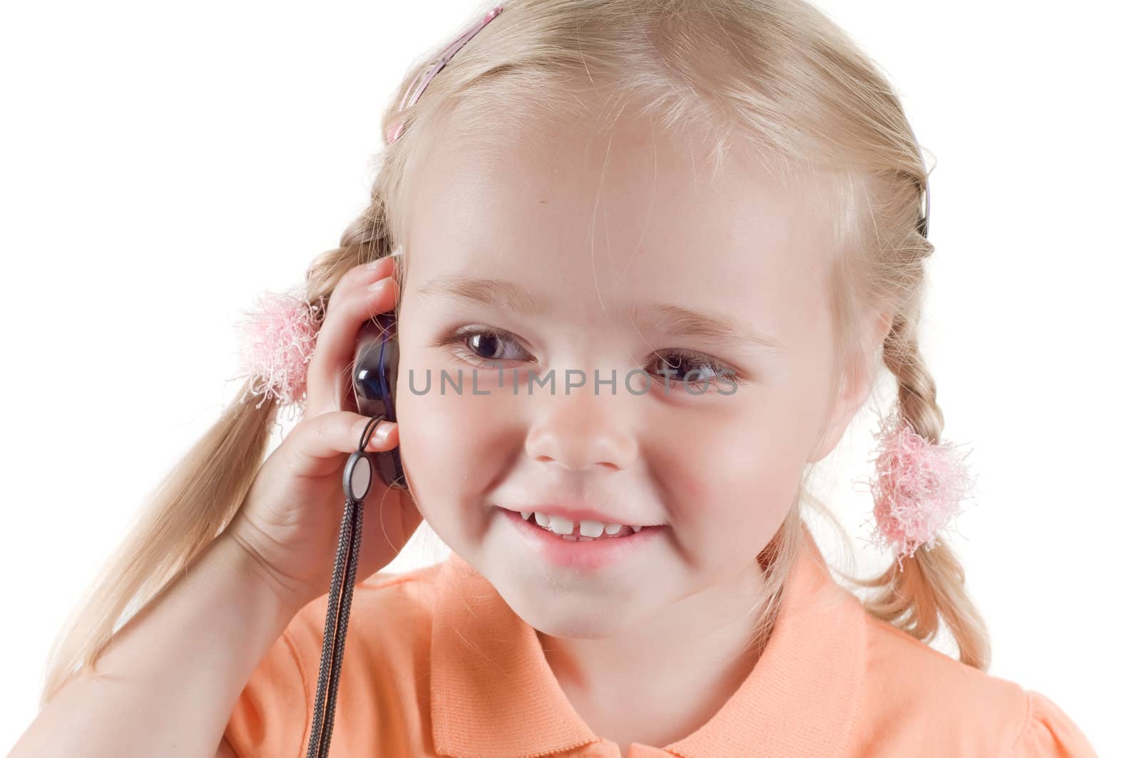 Shot of little girl with mobile in studio