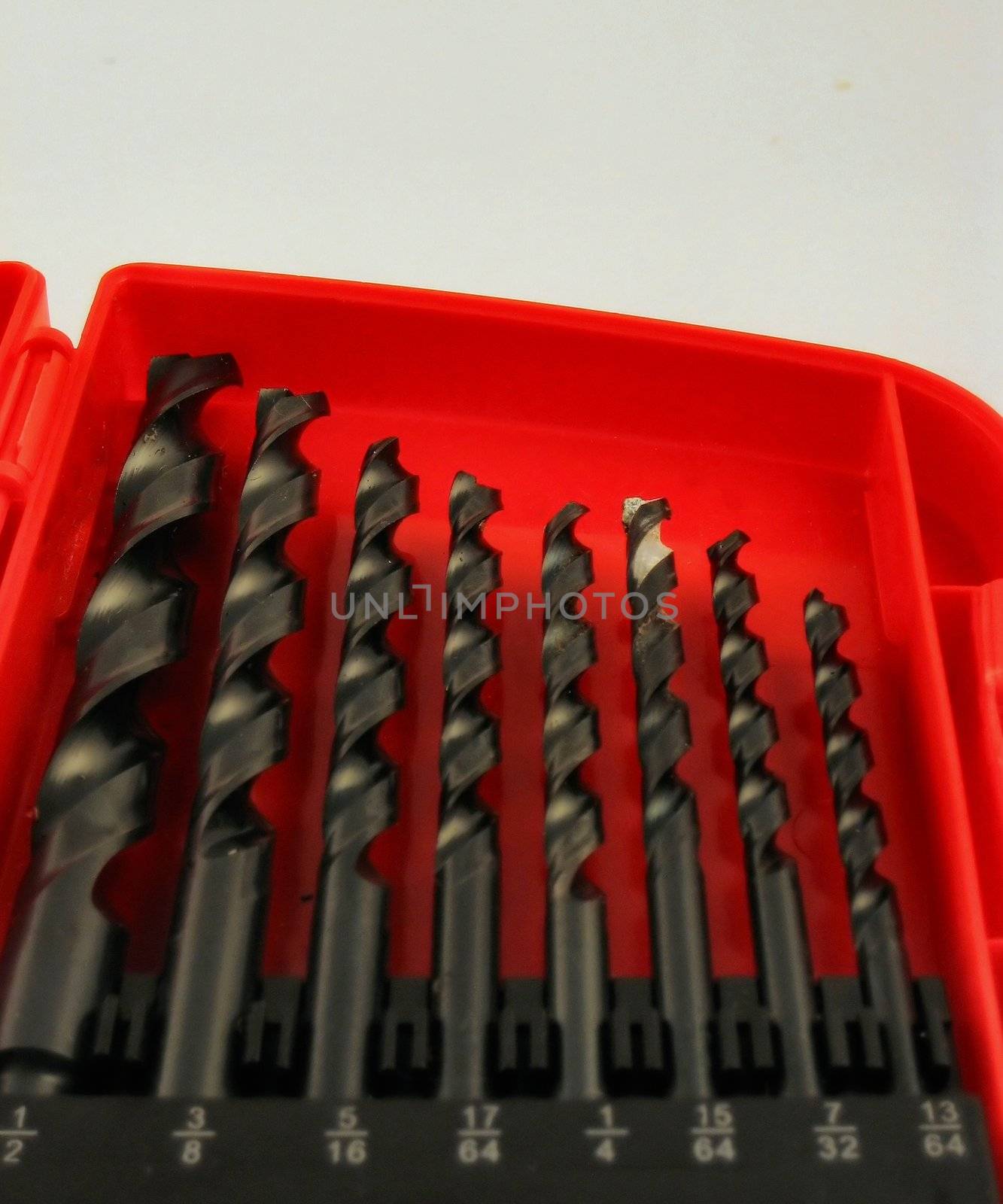 Drill bits in case and outside