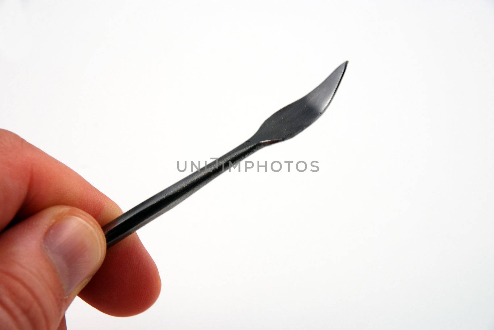 Stock pictures of metal dental instruments used to work on patients