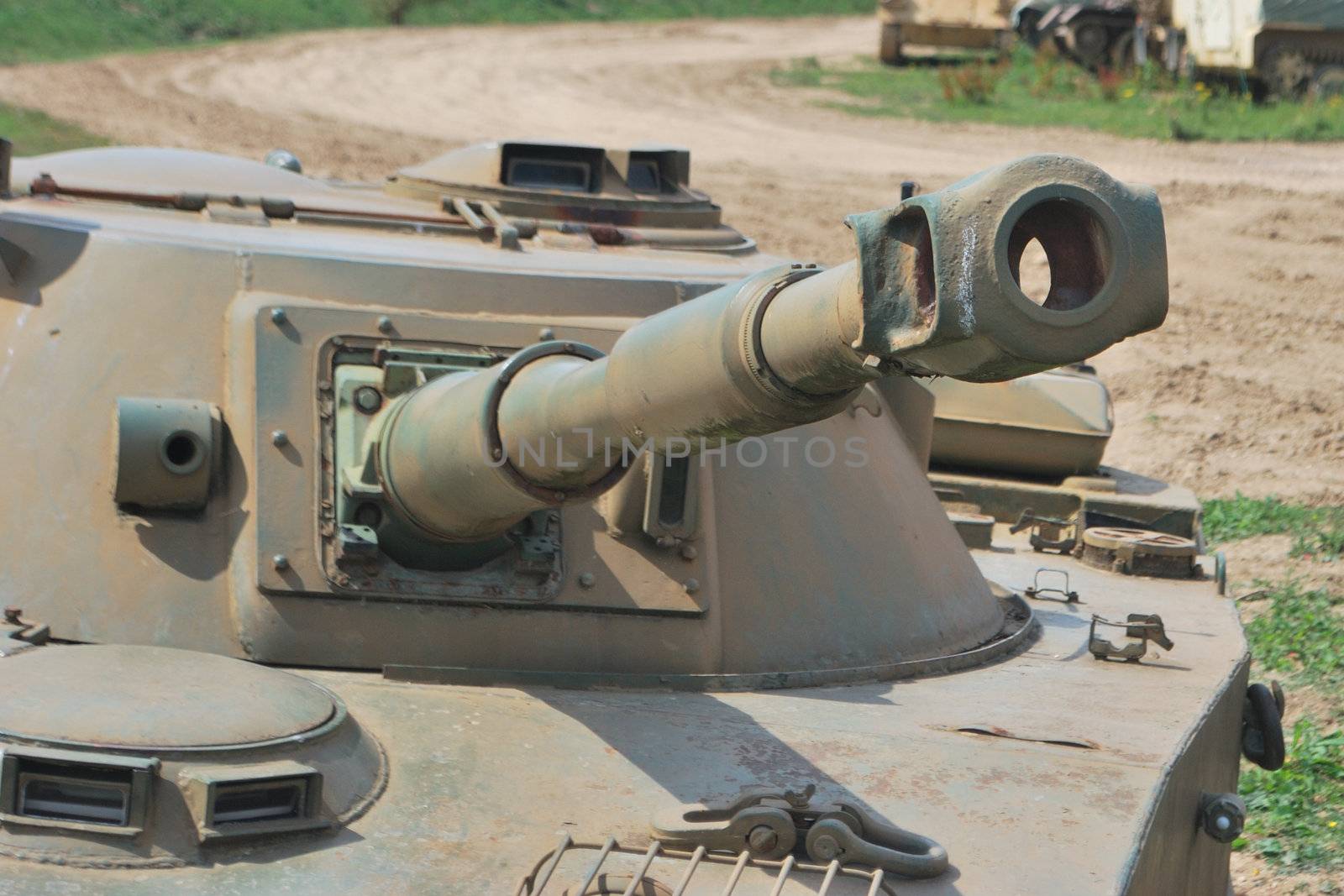 tank turret with barell pointing to camera