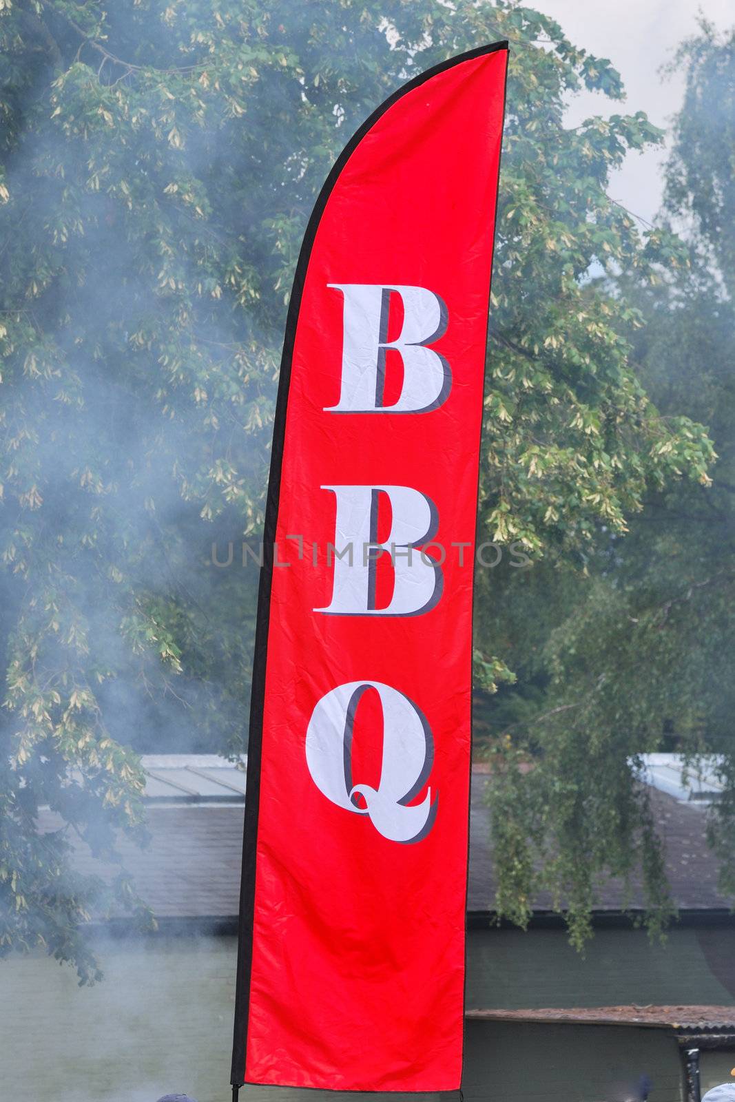 Large BBQ sign and smoke