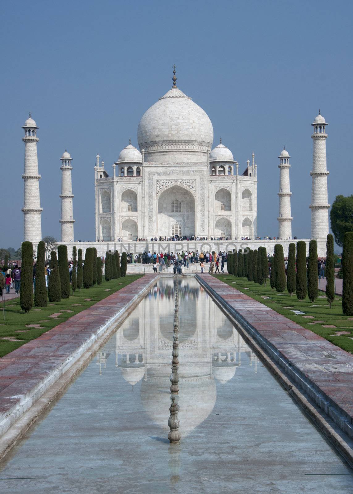 Long view on Taj Mahal mausoleum with reflection in canal at Ind by Claudine