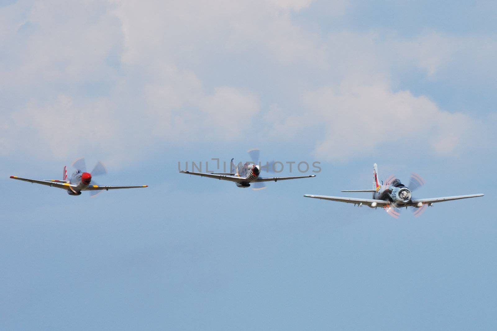 trio of war planes in flight