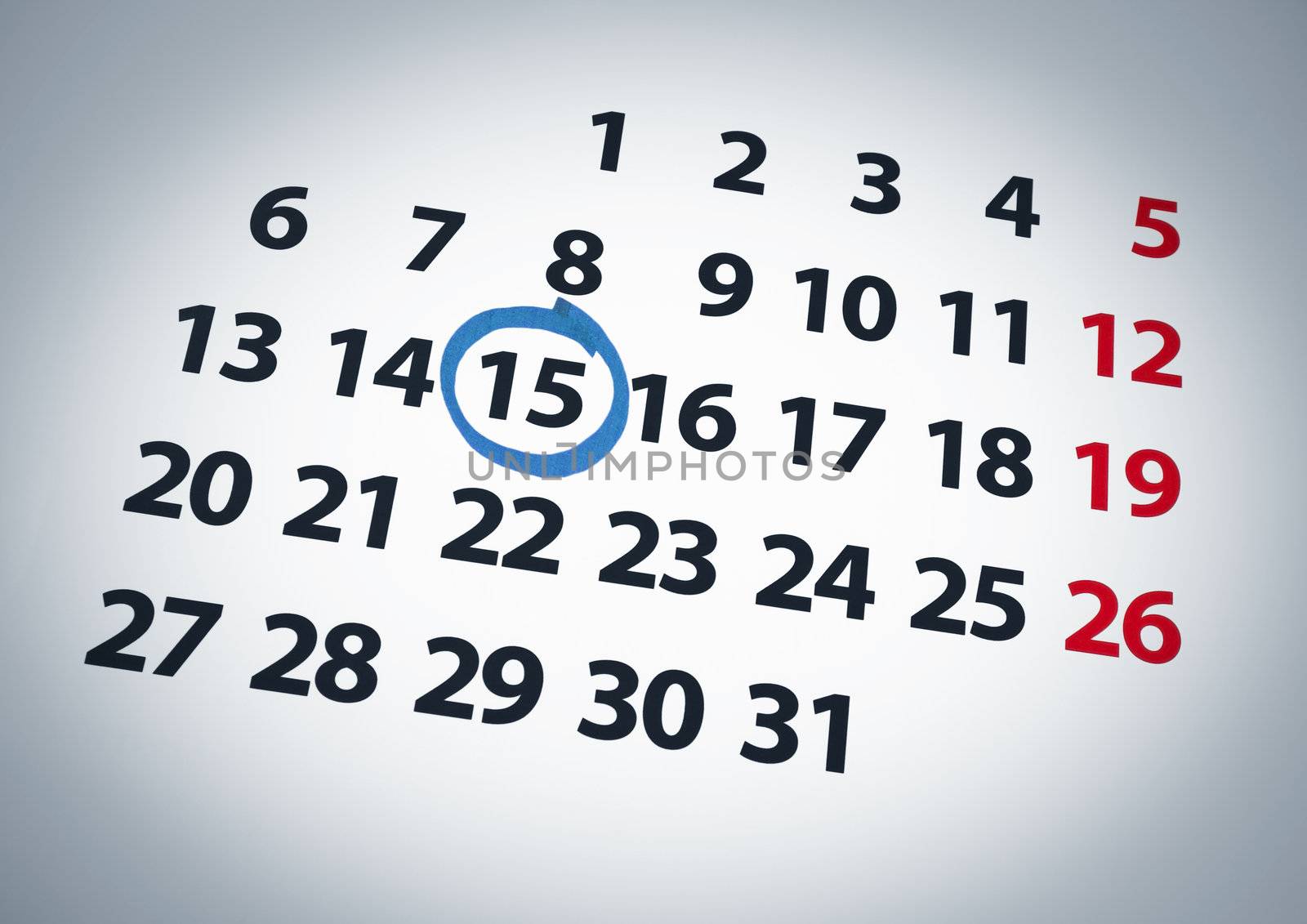 A date circled on a 15th day of a calendar with blue ink.