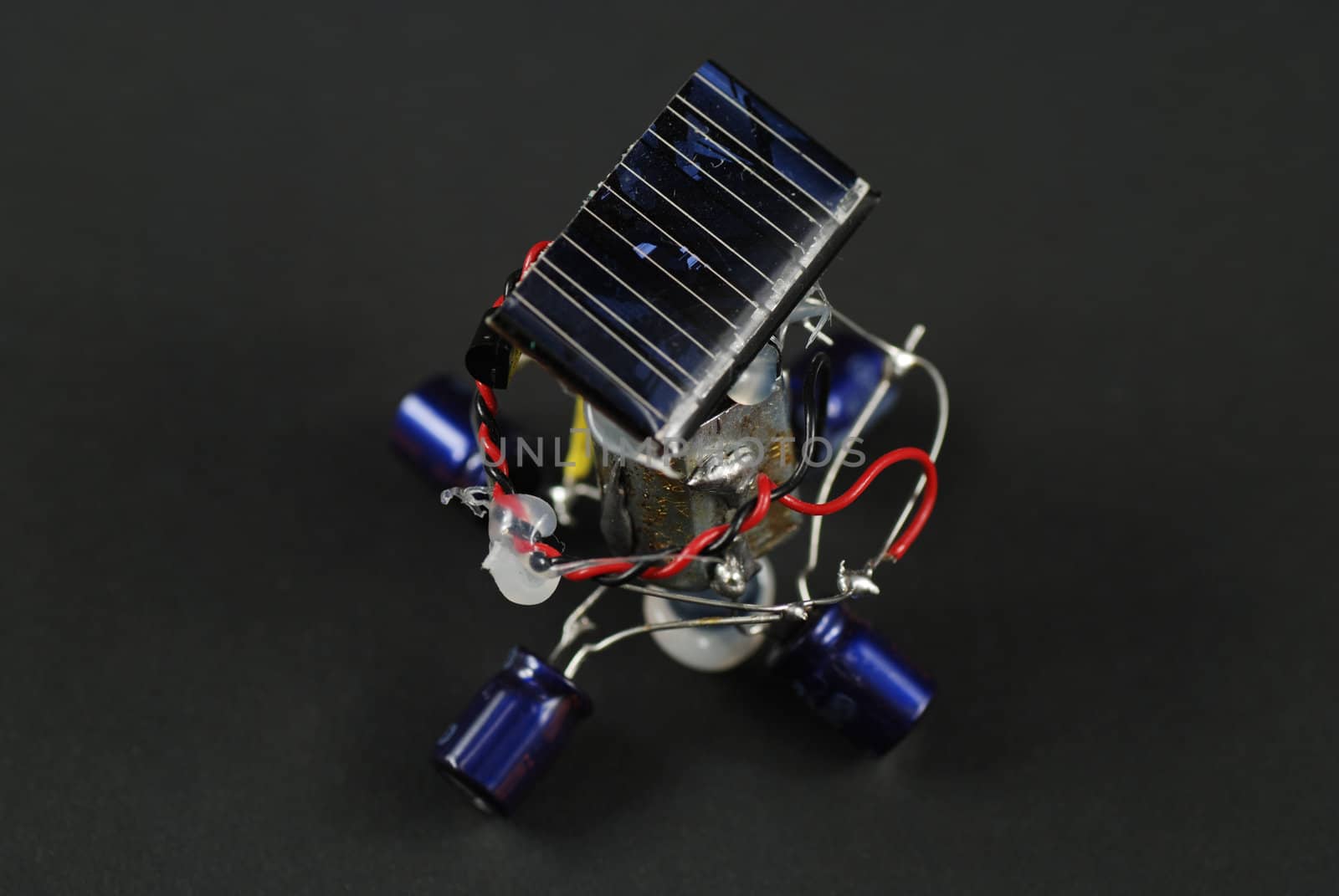 stock pictures of a robot powered by solar energy