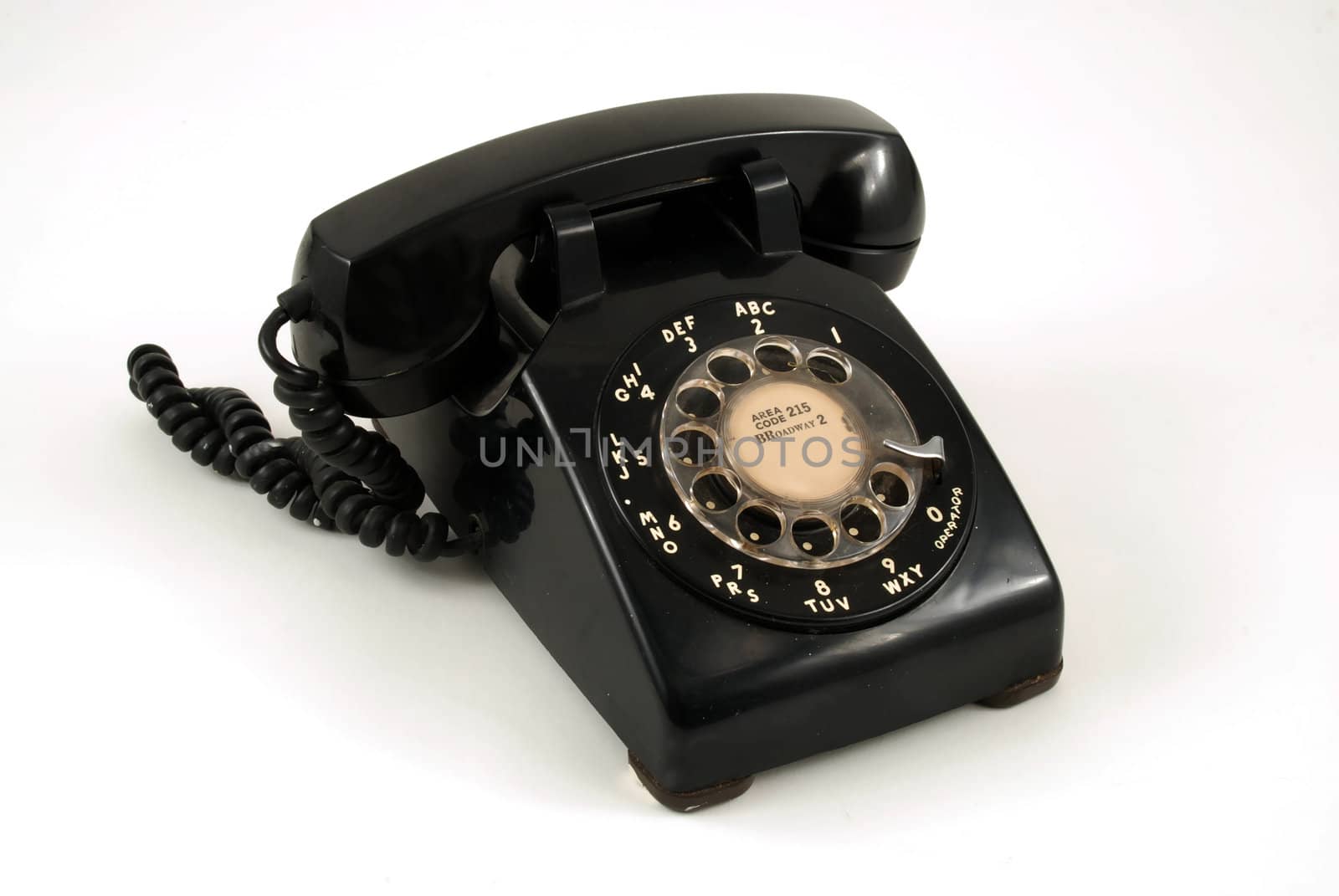 Pictures of an older, analog type telephone