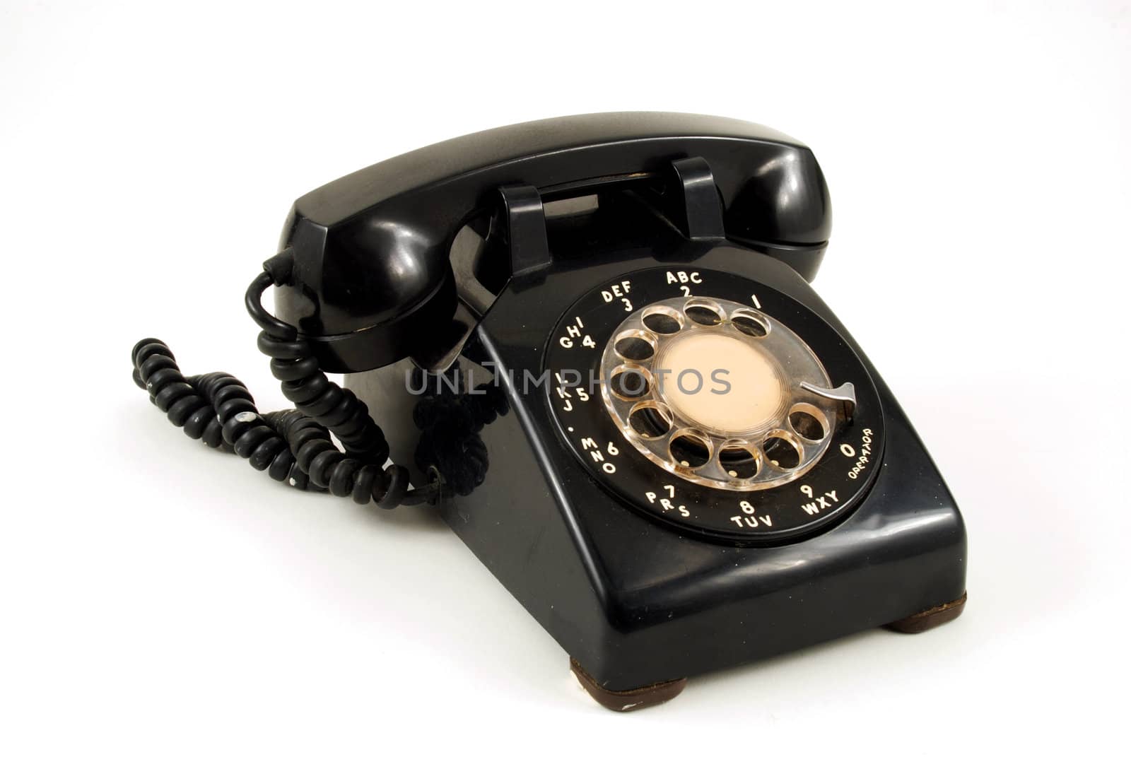 Pictures of an older, analog type telephone