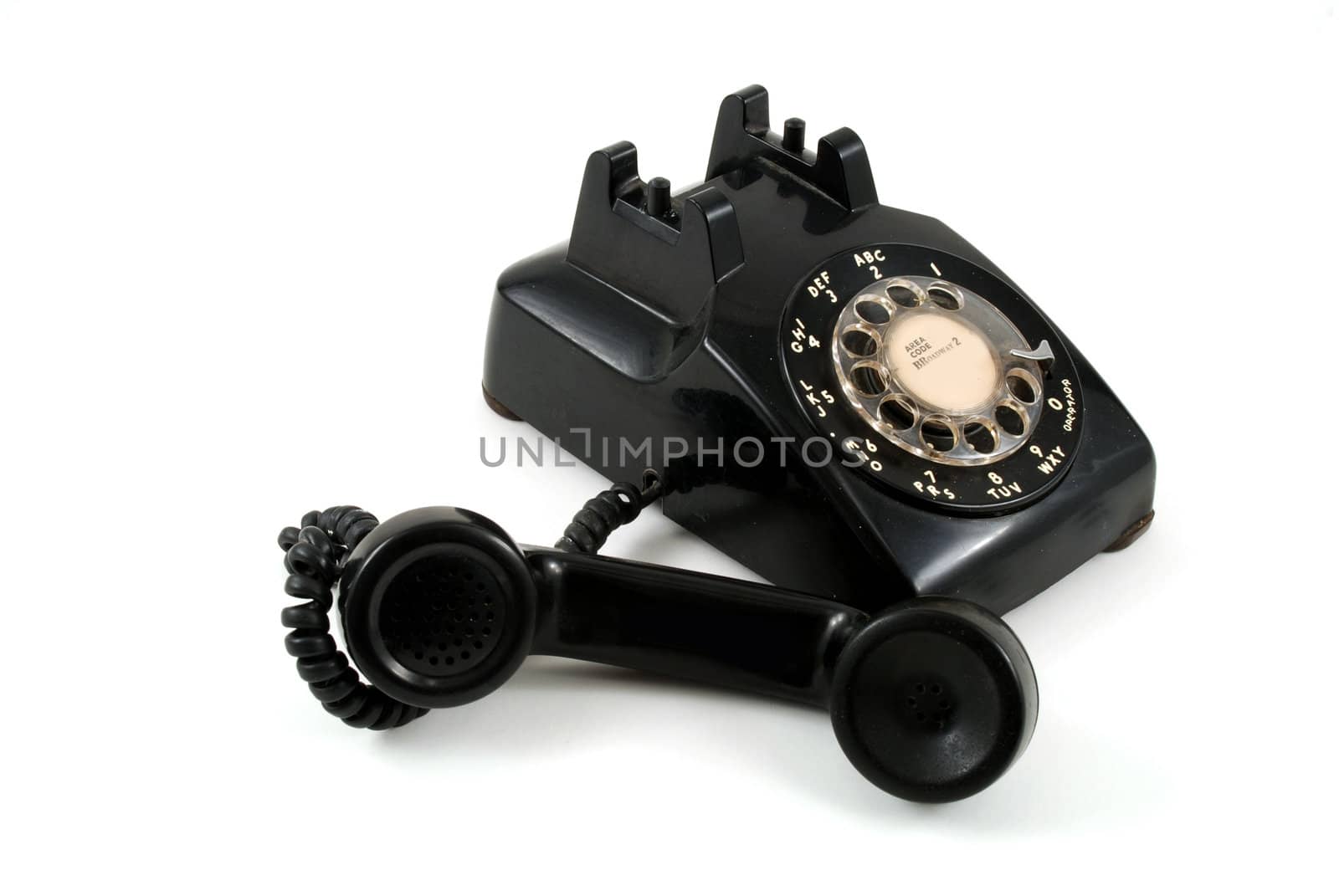 Pictures of an older, analog type telephone