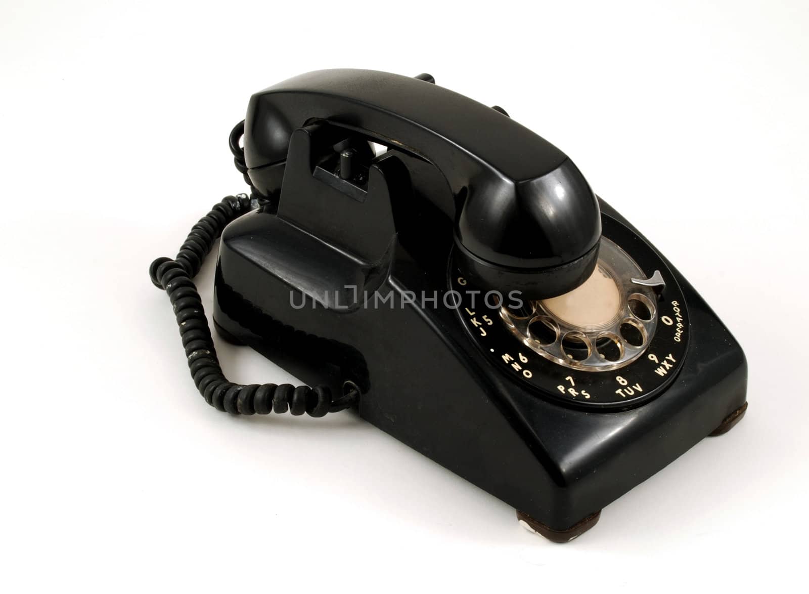 Pictures of an older, analog type telephone