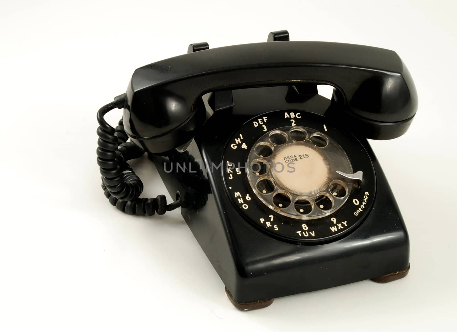 Pictures of an older, analog type telephone