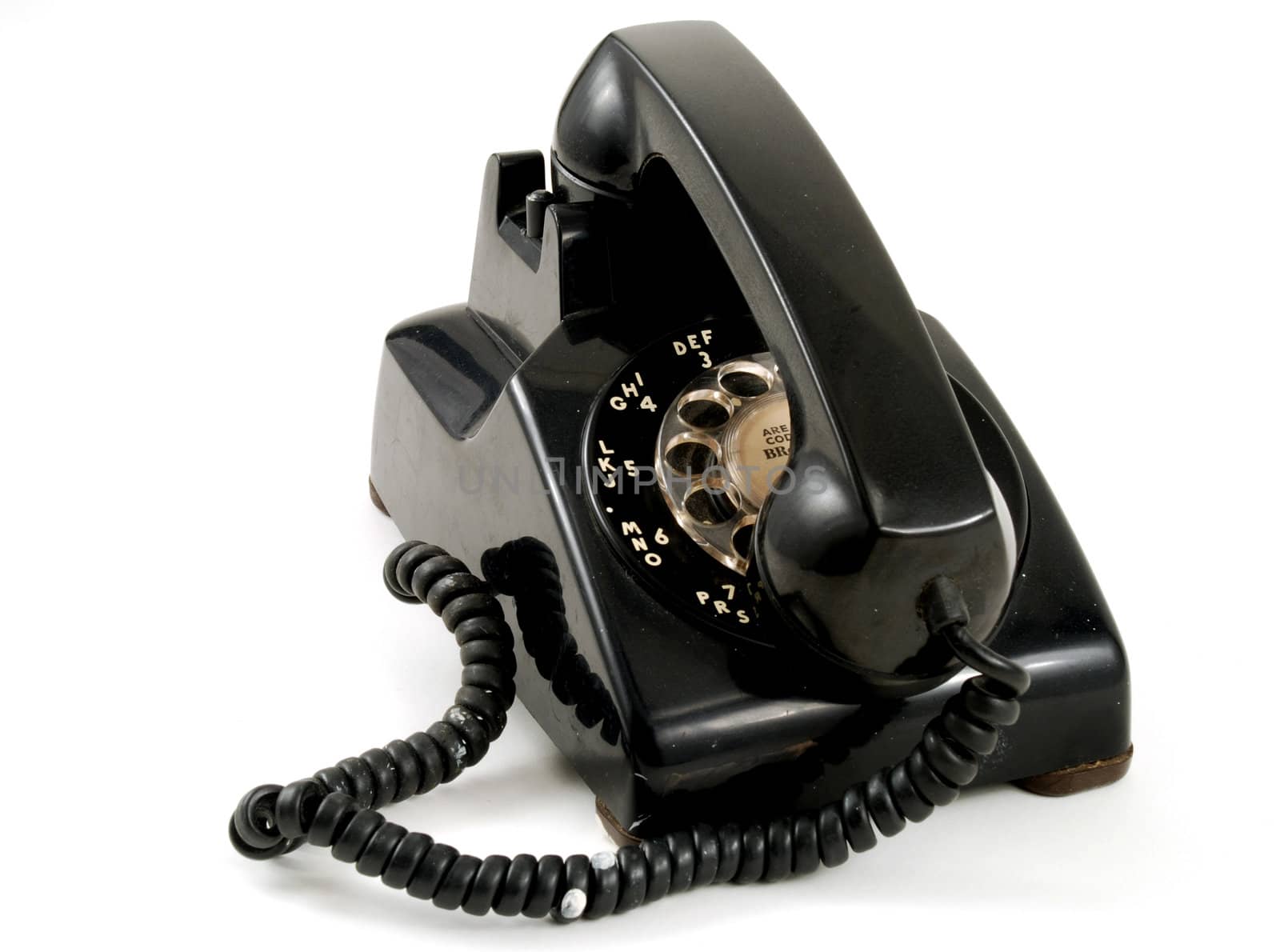 Pictures of an older, analog type telephone