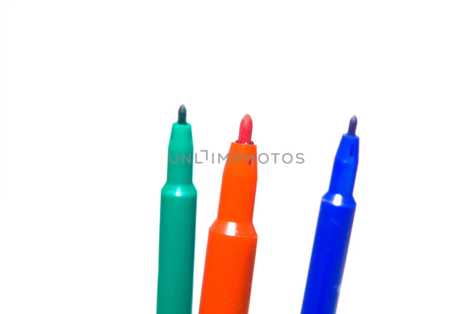 Color felt-tip pens photographed close up on a white background