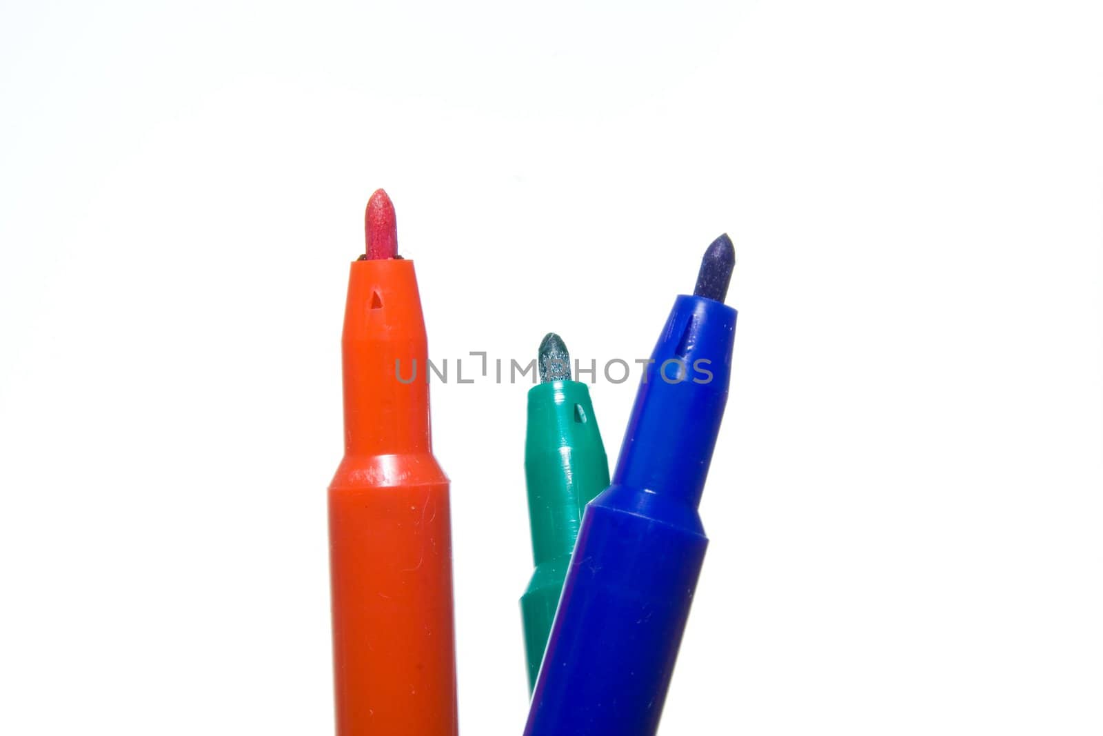 Color felt-tip pens photographed close up on a white background