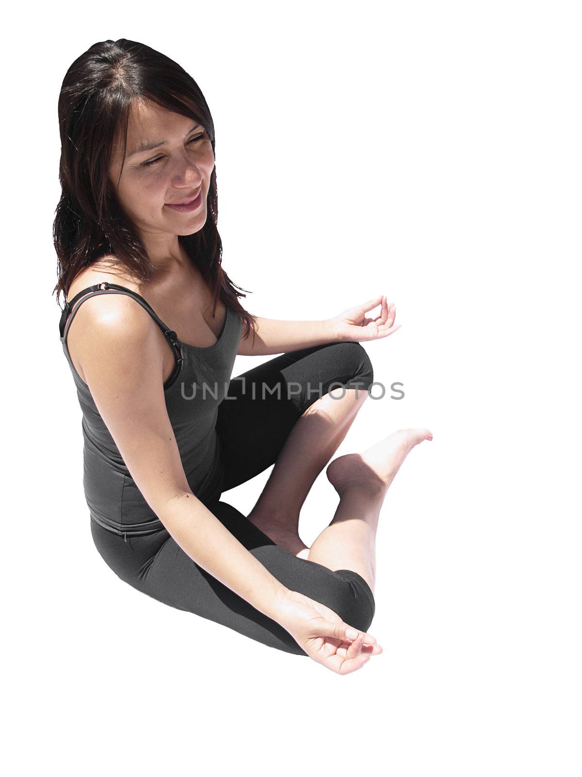 Young yoga woman relaxing in meditation seated