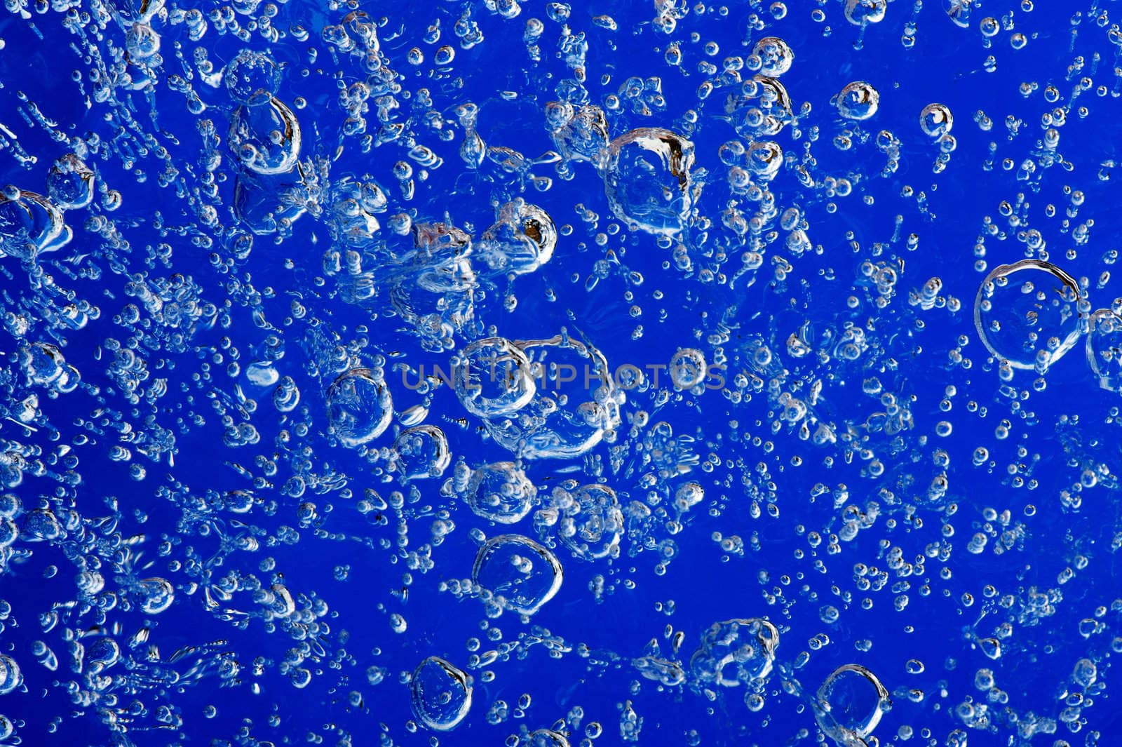 Air bubbles frozen in ice. Close-up