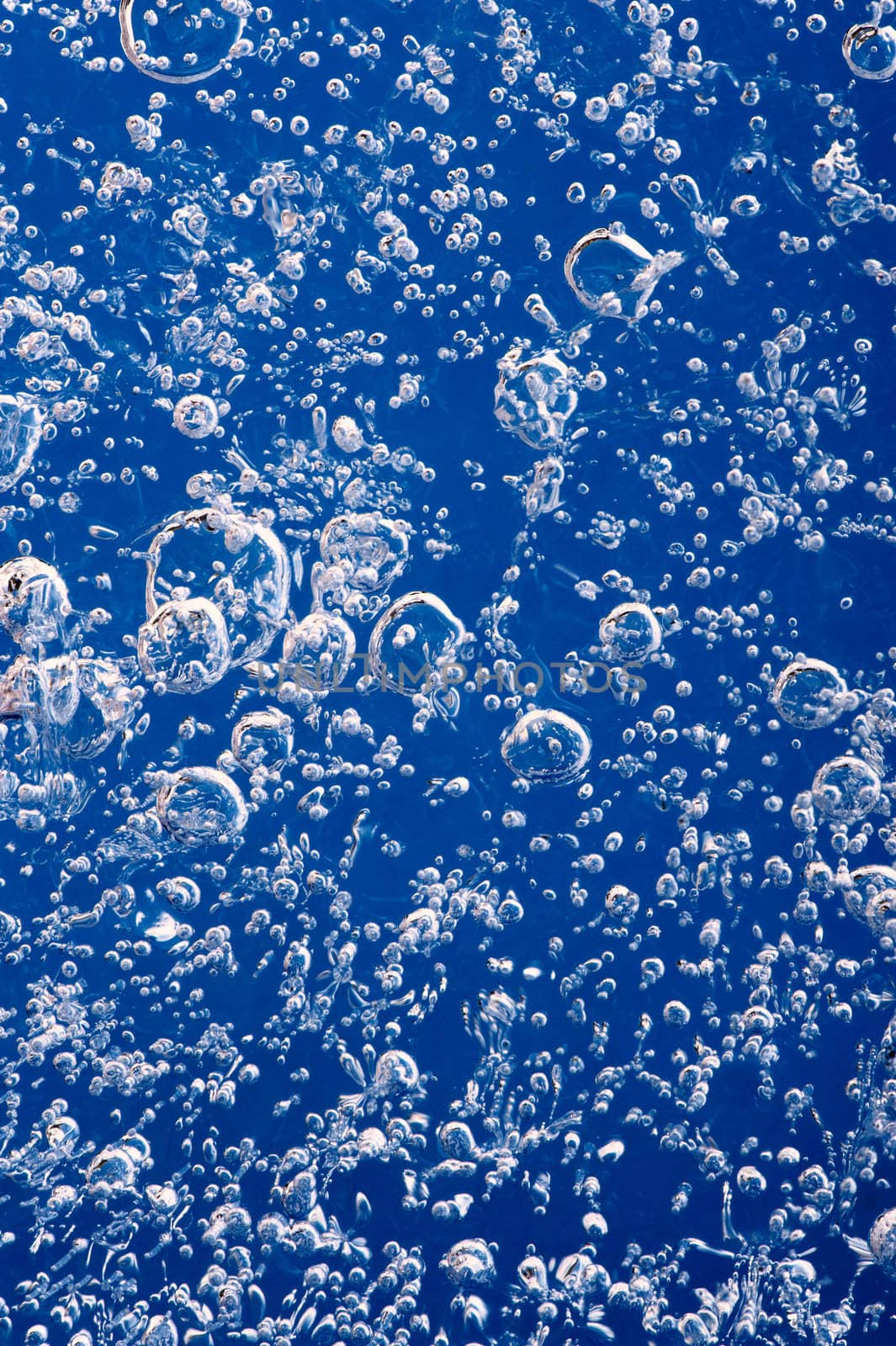 Air bubbles frozen in ice. Close-up