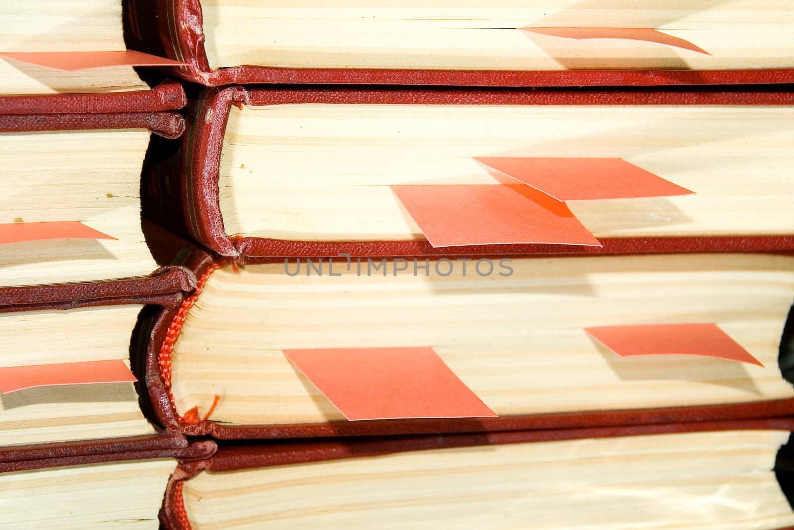 Old books in darkly red covers