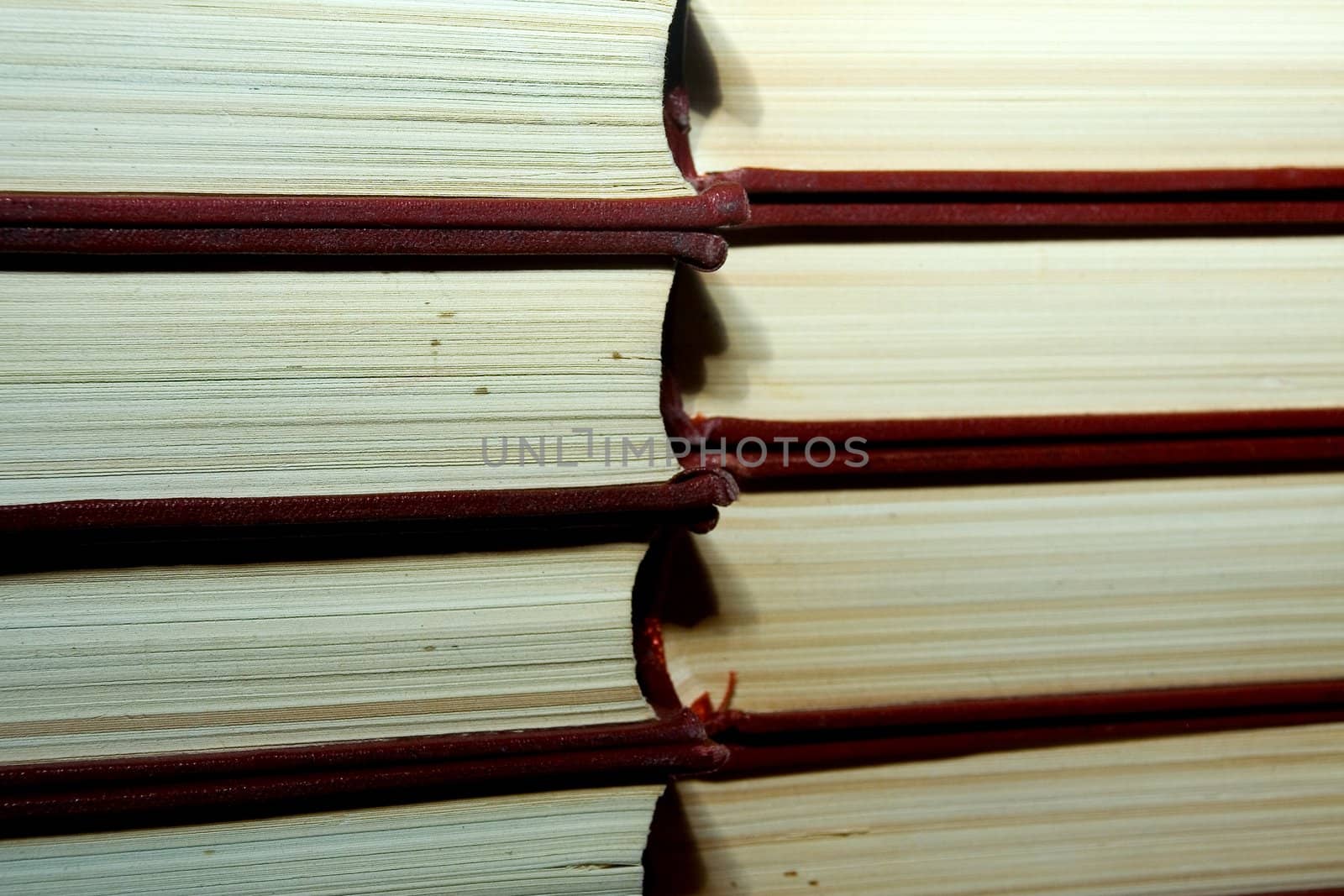 Old books in darkly red covers