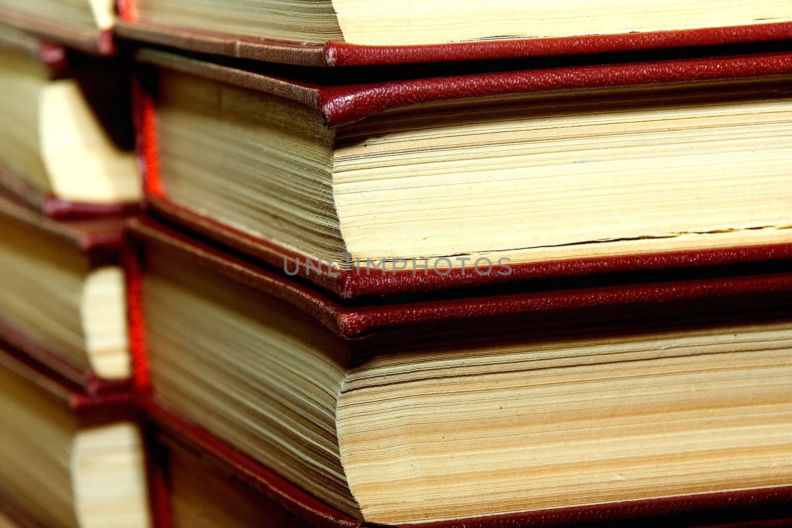 Old books in darkly red covers