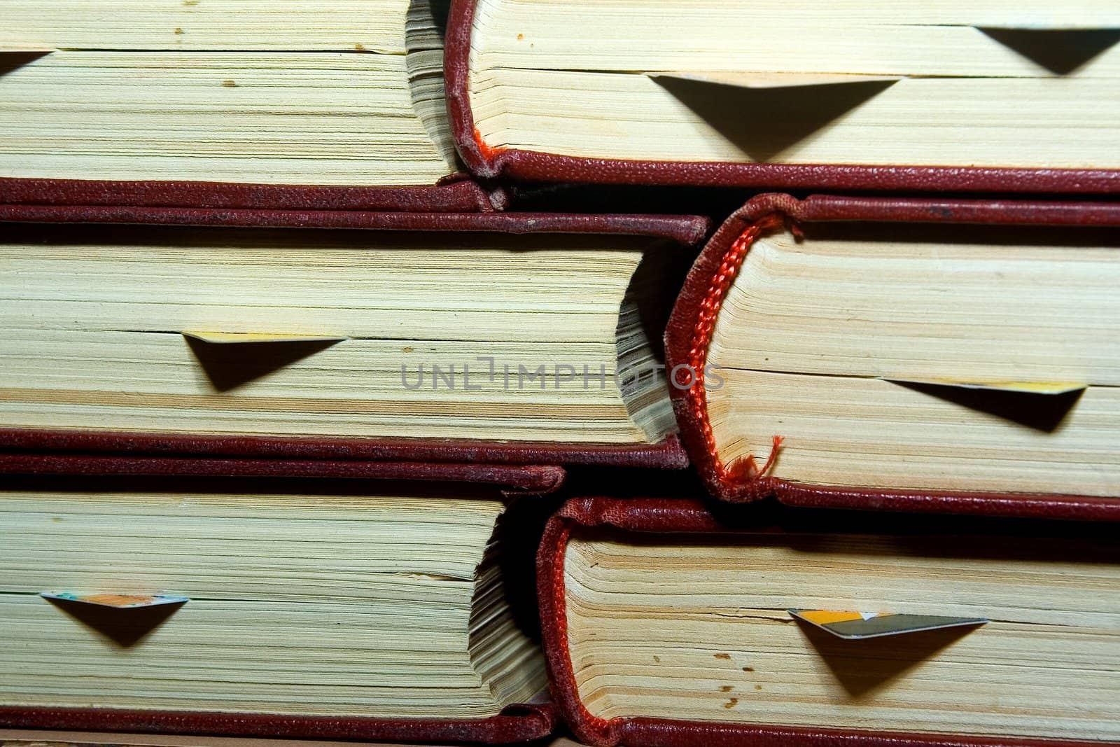 Old books in darkly red covers