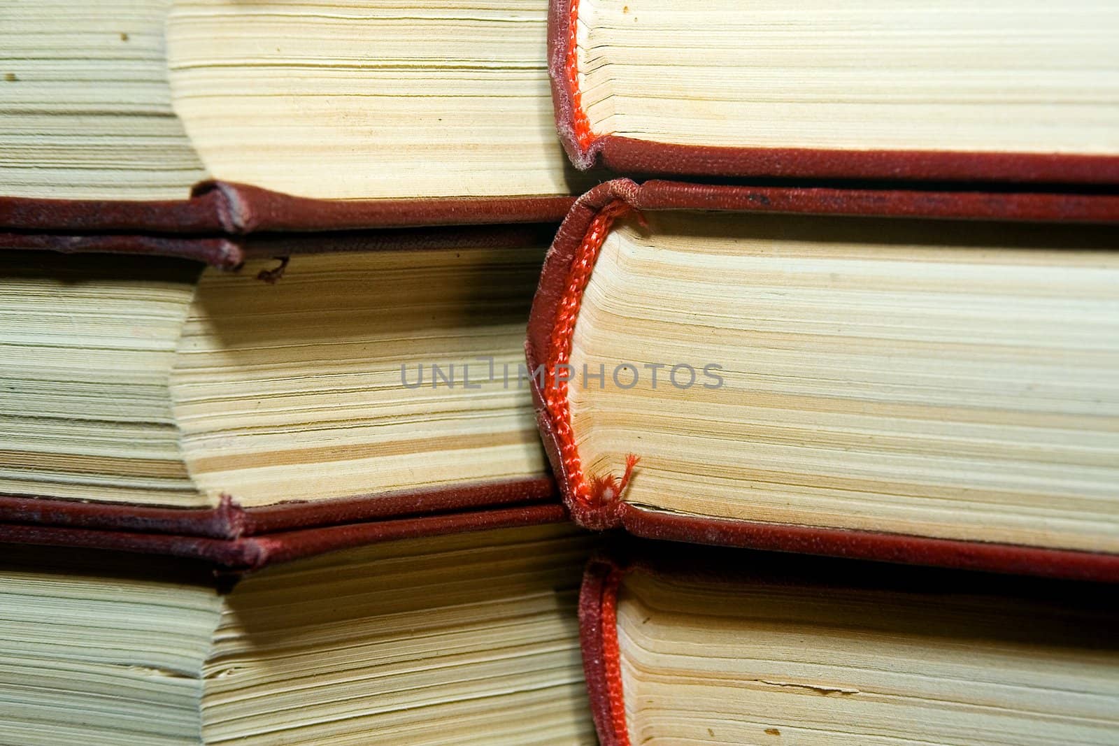 Old books in darkly red covers