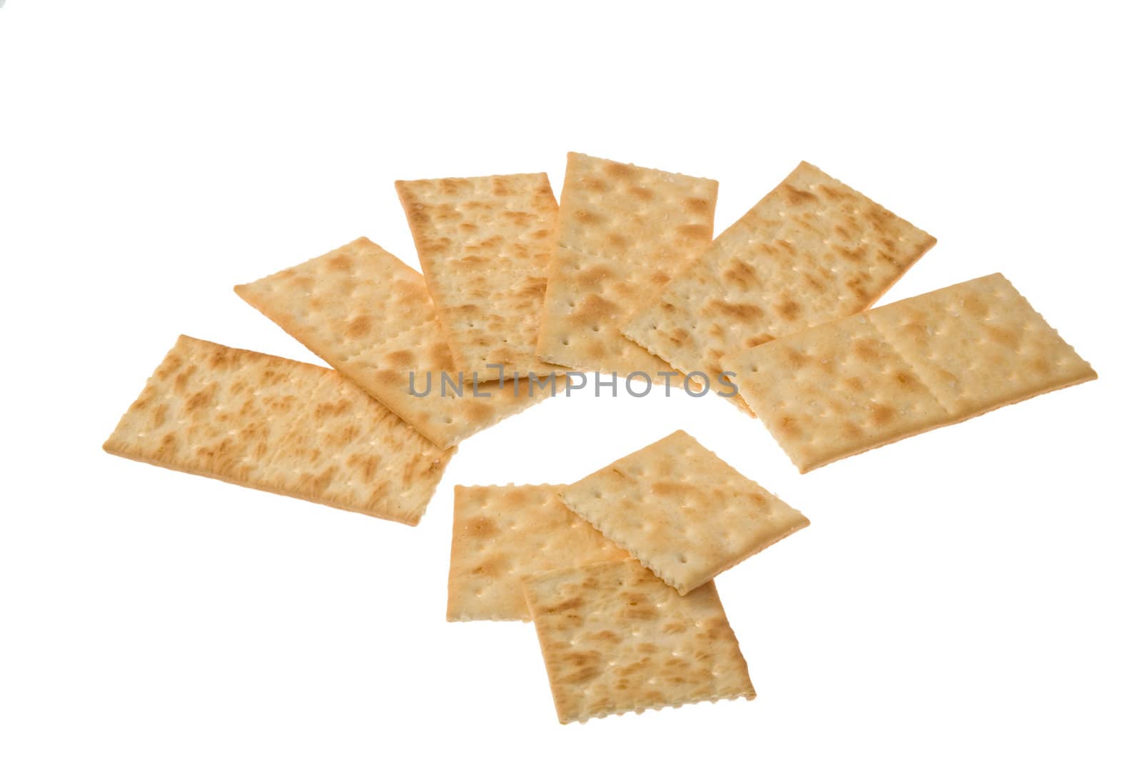 Several crackers isolated over white background.