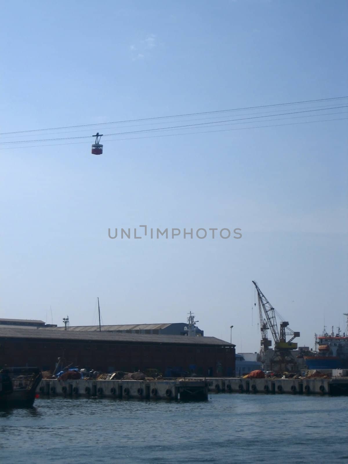 Several pictures of ships in the harbor