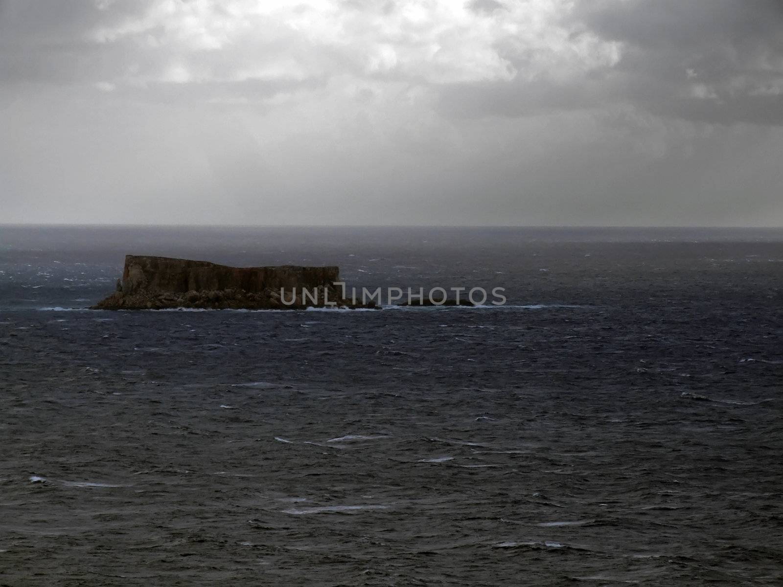 Small uninhabited rocky island off the southern coast of Malta called Filfla. Was used for target practice during WWII. Once had a chapel, which was destroyed during seismic activity. 