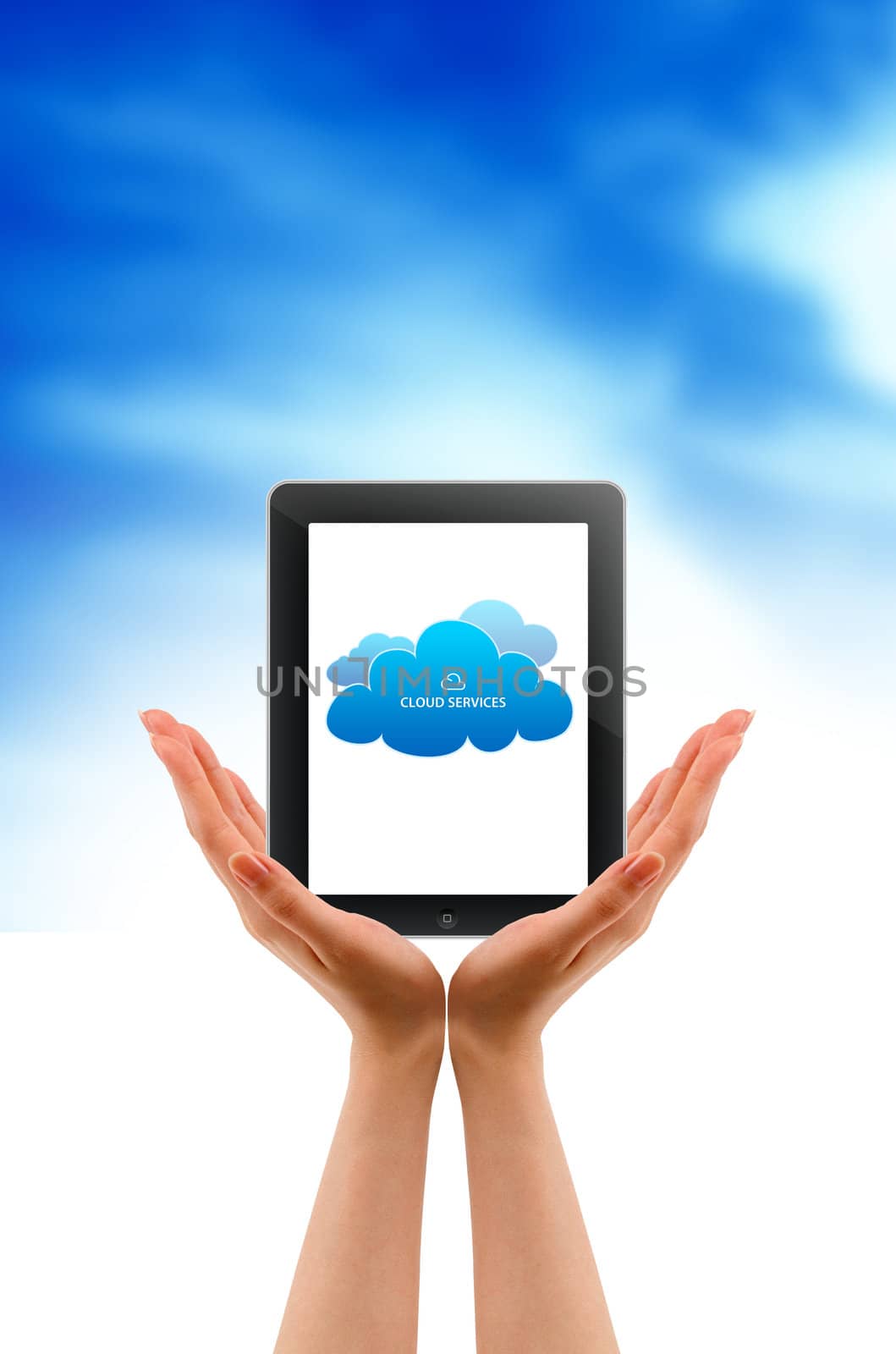 Hands holding a tablet pc with cloud icons.