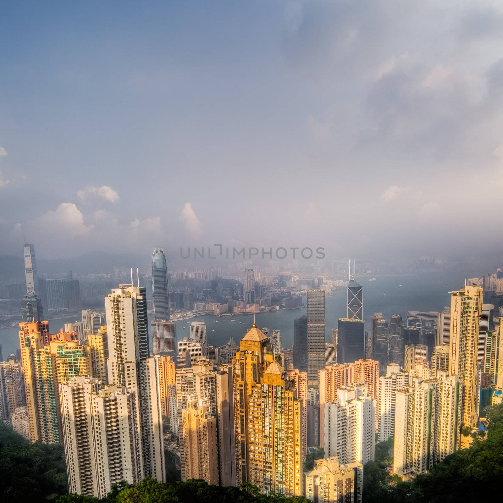 Dramatic cityscape with skyscraper and blue sky in Hong Kong.