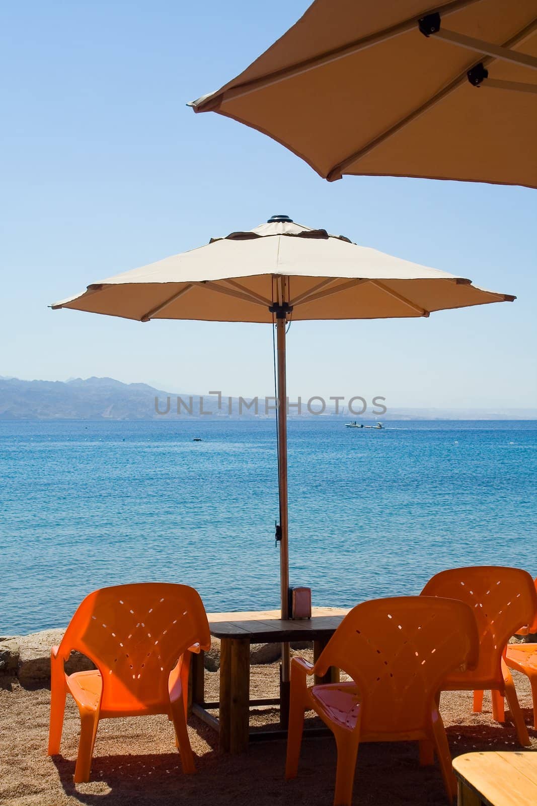 Summer cafe on the sea beach. Eilat. Israel.