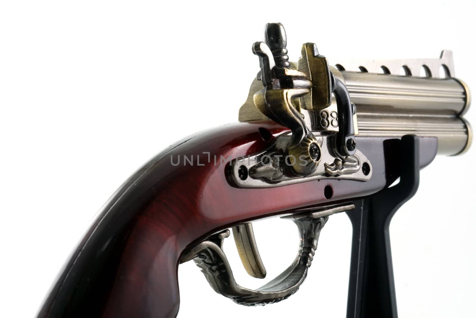 Desktop model of an ancient pistol on white background. Isolated object.