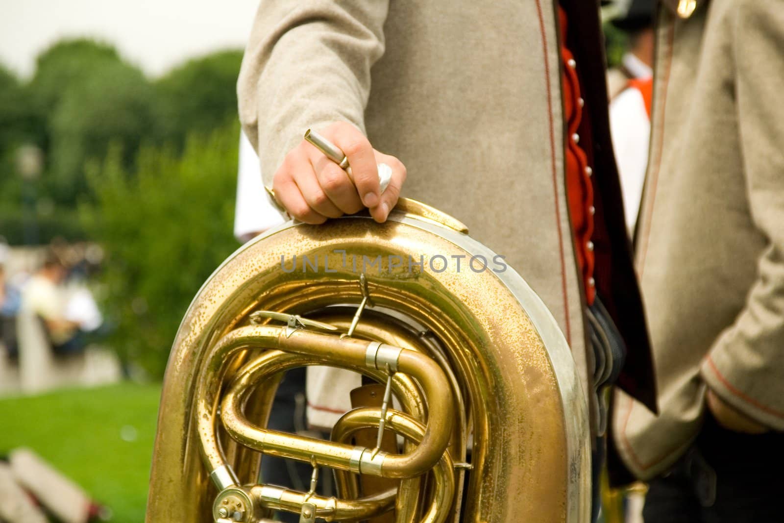Hands of musicians of the military orchestras dressed in an ancient uniform