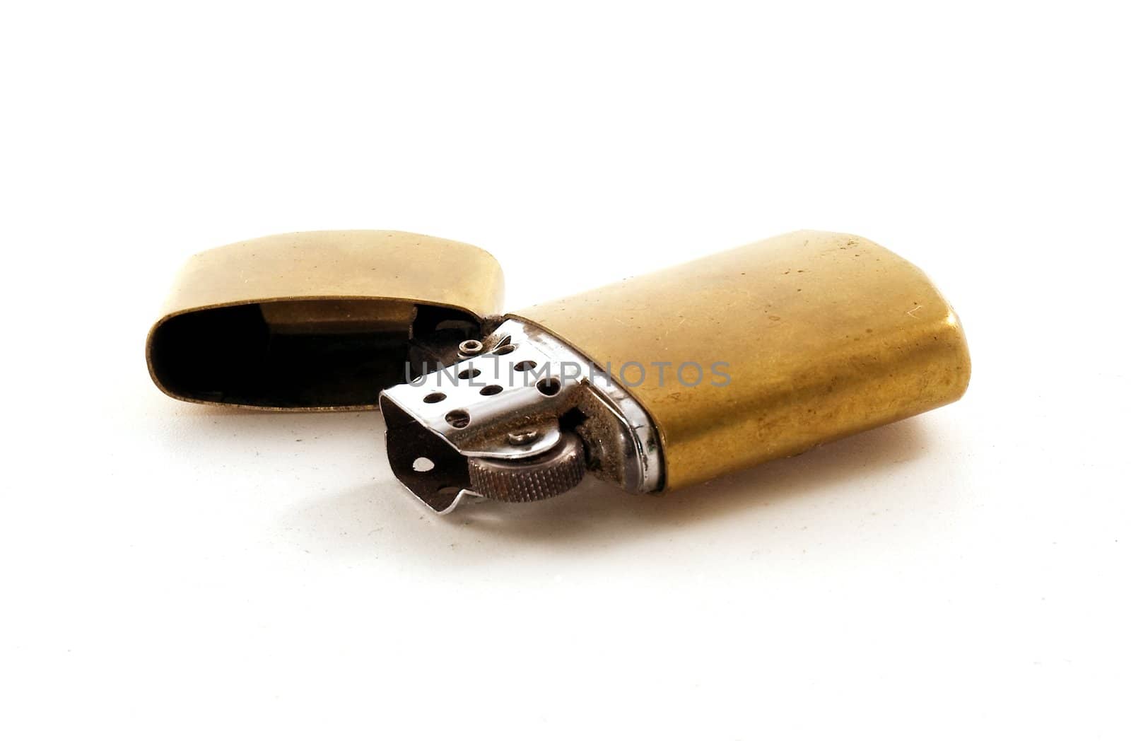 Old gasoline lighter on white background. Isolated object.