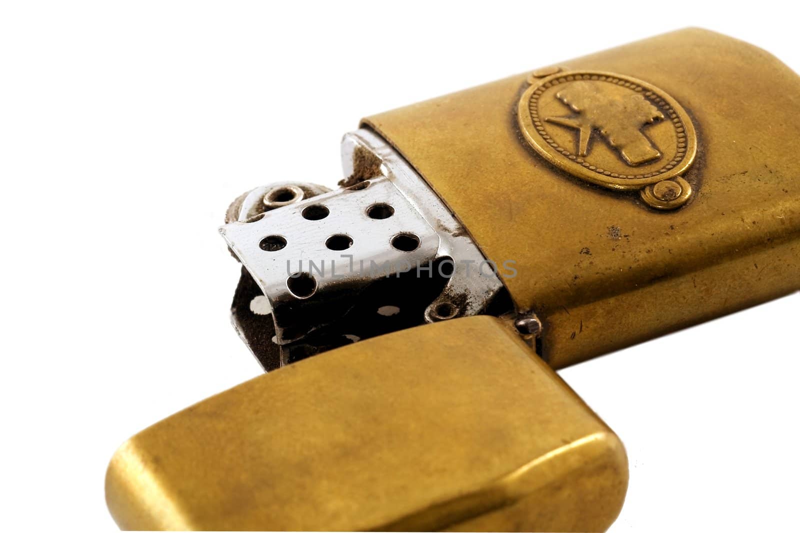 Old gasoline lighter on white background. Isolated object.