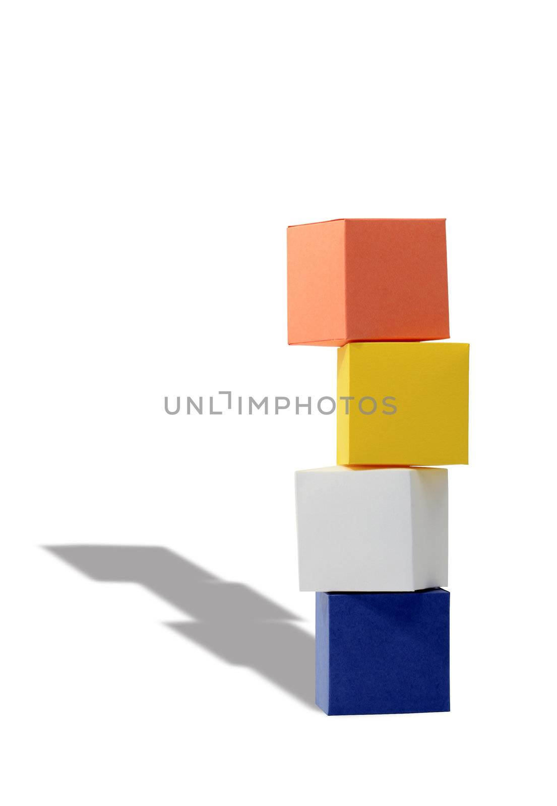 Vertical stack of colored cubes isolated on white background with clipping path