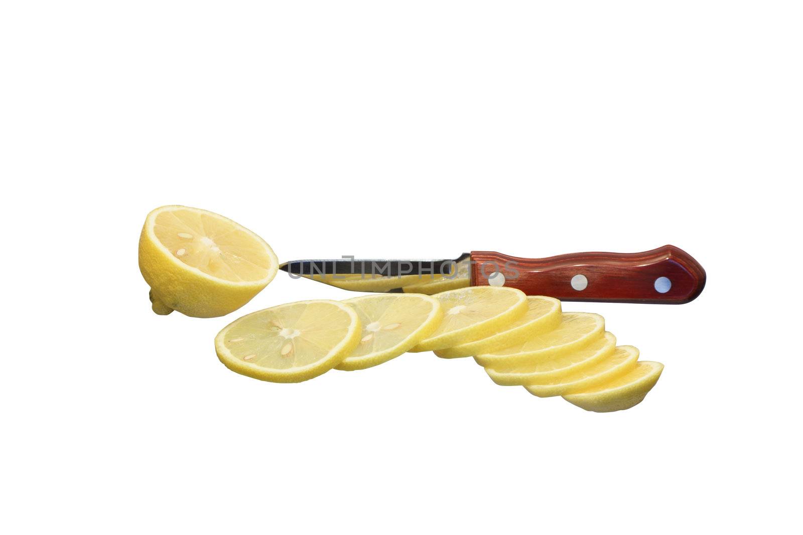 Sliced lemon and knife isolated on white background with clipping path