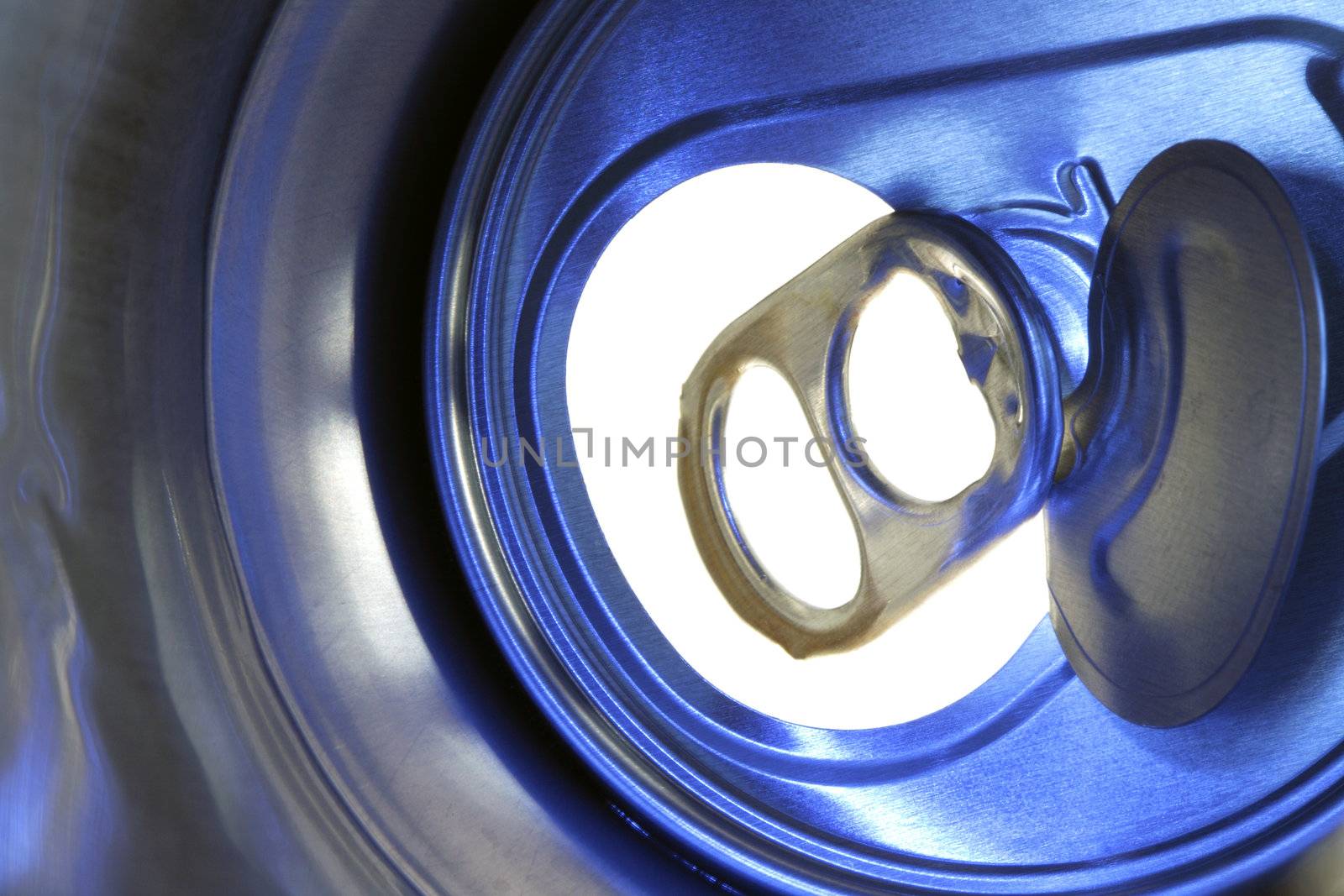 Image made inside empty beer can against light. Abstract bacground. Closeup