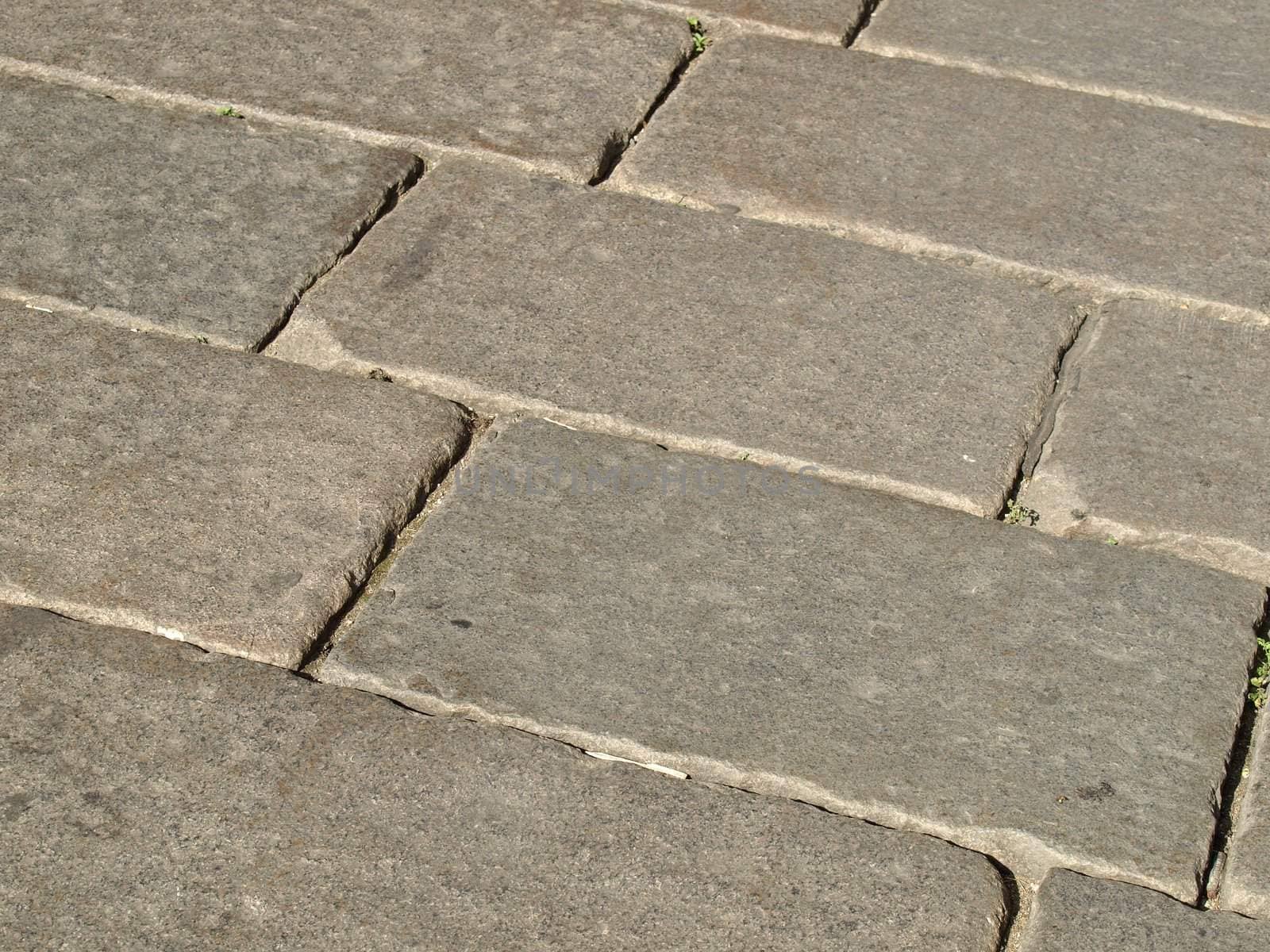 Stone paving floor of a street sidewalk