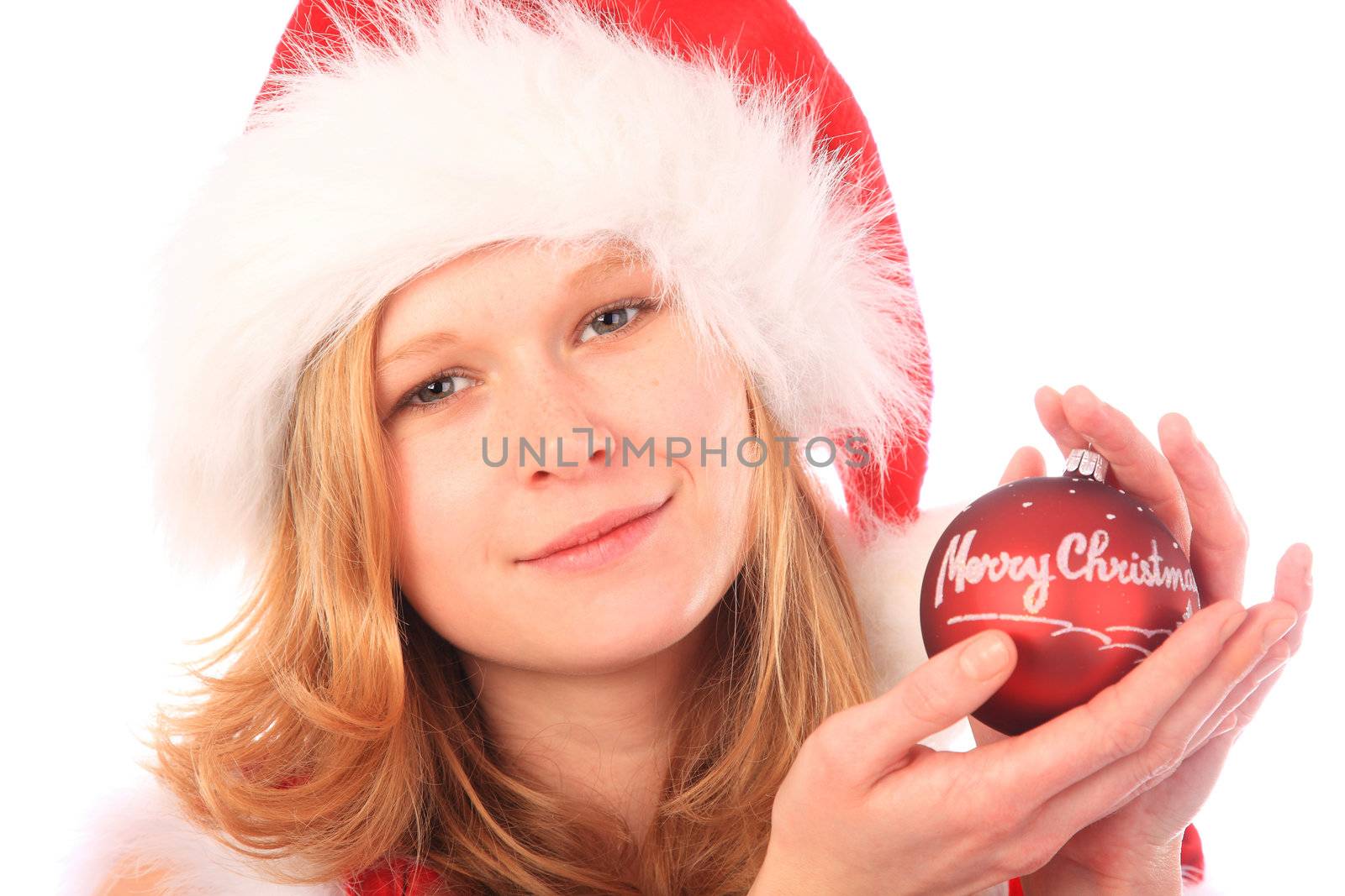 Miss Santa is holding a red christmas tree ball - "Merry Christmas" is written on the ball