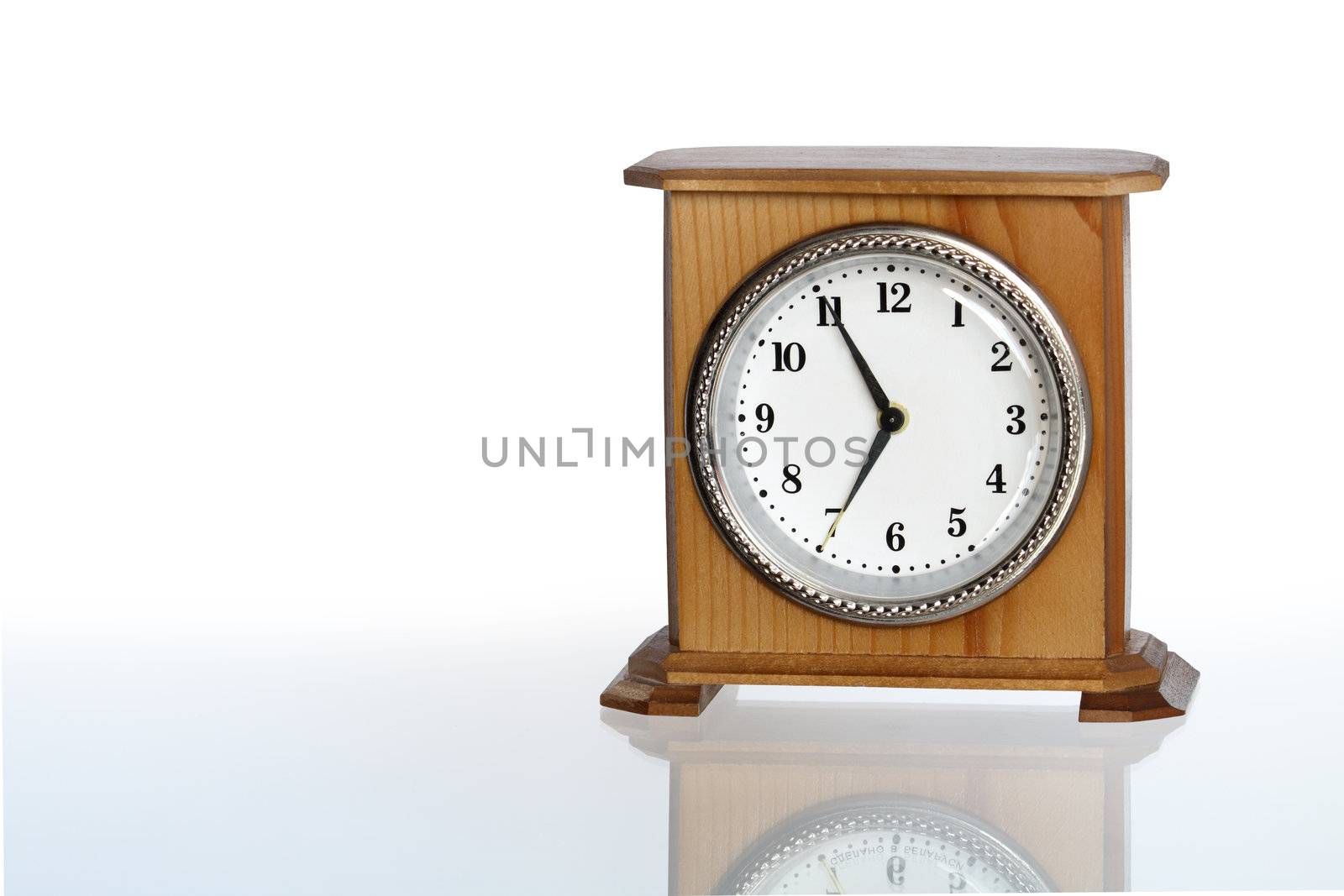 Wooden alarm clock isolated on white background with clipping path