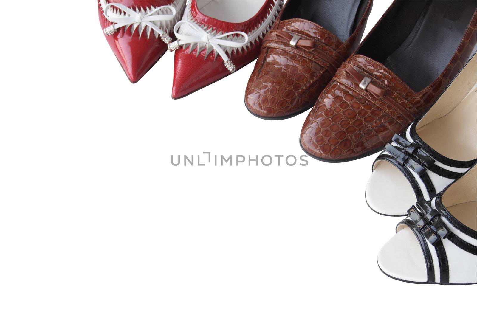 Three pair of various women's shoes isolated on white with clipping path